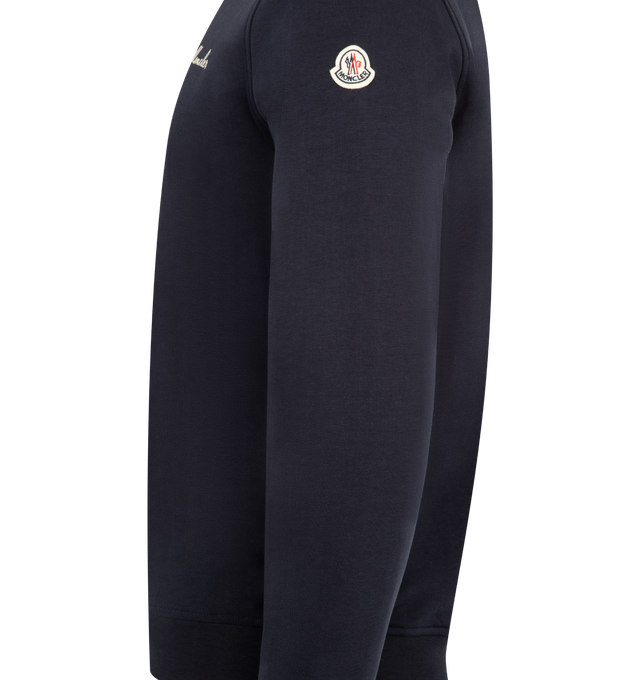 Image 3 of 3 - NAVY - MONCLER Quarter Zip Sweatshirt featuring logo on front, logo patch on sleeve, long sleeves, ribbed hem and cuffs and quarter zip collar. 
