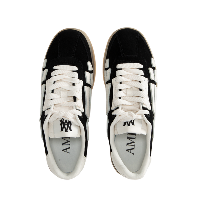 Image 5 of 5 - BLACK - Amiri Pacific Bones Sneakers are a lace-up style with leather bone appliques and rubber soles. Leather and rubber. Made in China.  