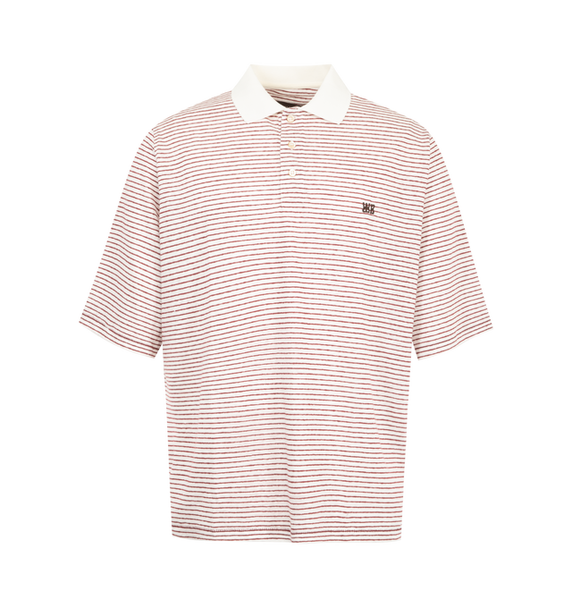 Image 1 of 2 - RED - Wales Bonner Men's Bask Striped Linen and Cotton Polo Shirt is crafted from a lightweight linen and cotton blend and features an allover striped motif with a contrasting white polo collar. Designed in a relaxed silhouette, this short-sleeve polo showcases the houses distinctive approach to color and texture while maintaining a refined casual feel. Main Material: 88% Linen, 12% Cotton. Details: 100% Cotton. Collar: Polo Collar. Sleeves: Short Sleeves. Fit: Loose Fit. Made in Portugal. 