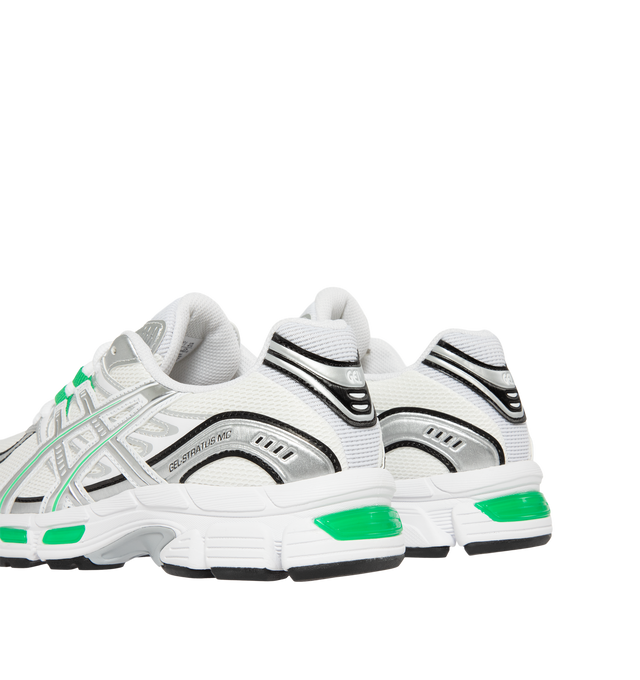 Image 3 of 5 - WHITE - Asics Men's GEL-STRATUS MC Sneakers feature an air mesh upper with synthetic leather overlays for breathable comfort, durability, and a technical-inspired look. Drawing from the brand's 2010s running heritage, these lifestyle sneakers combine rearfoot GEL technology with a cushioned midsole for enhanced shock absorption and everyday comfort. Main Material: Synthetic Leather and Mesh. Sole: Rubber.  