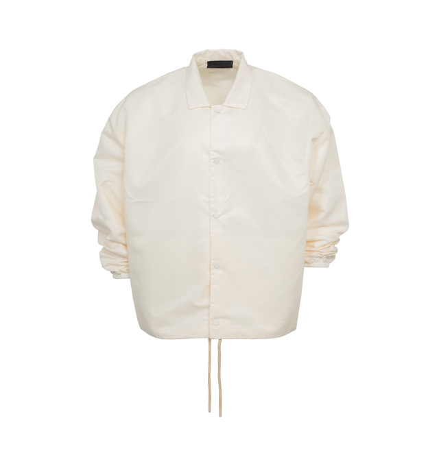 WHITE - FEAR OF GOD ESSENTIALS Coaches Jacket featuring rubberized label at back collar, snap button closure, side seam pockets, shirt collar, elasticated cuffs, and drawstring at the waist hem. 100% nylon.