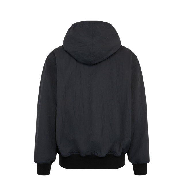 Image 2 of 3 - BLACK - Studio Nicholson Men's Wickett Jacket is crafted from Italian-milled water-repellent technical fabric and features a relaxed silhouette with a drawcord hood and soft rib-knit trims. Designed as an elevated interpretation of a classic sportswear staple, this versatile jacket is lined in a warm wool blend for added comfort and insulation while maintaining a clean, understated appearance. Main Material: 100% Polyamide. Lining: 70% Wool, 30% Polyamide.  