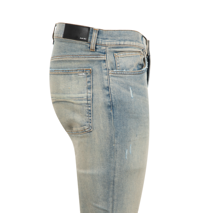 Image 3 of 3 - BLUE - Amiri Suede MX1 Jeans are a 5-pocket style with a button fly,  hand distressing, and suede patches: 92% cotton, 6% elastomultiester, 2% elastane.  