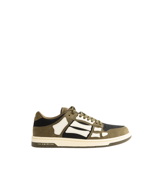 Image 1 of 5 - GREEN - Amiri Mens Skel Top Low Sneakers are crafted with a suede leather upper and signature pebbled leather bone appliqus. Feature contrast topstitching, lace-up closure, padded collar, two-tone rubber sole, and low-top silhouette. Main Material: Leather Upper; Sole: Rubber. Made in Vietnam. 