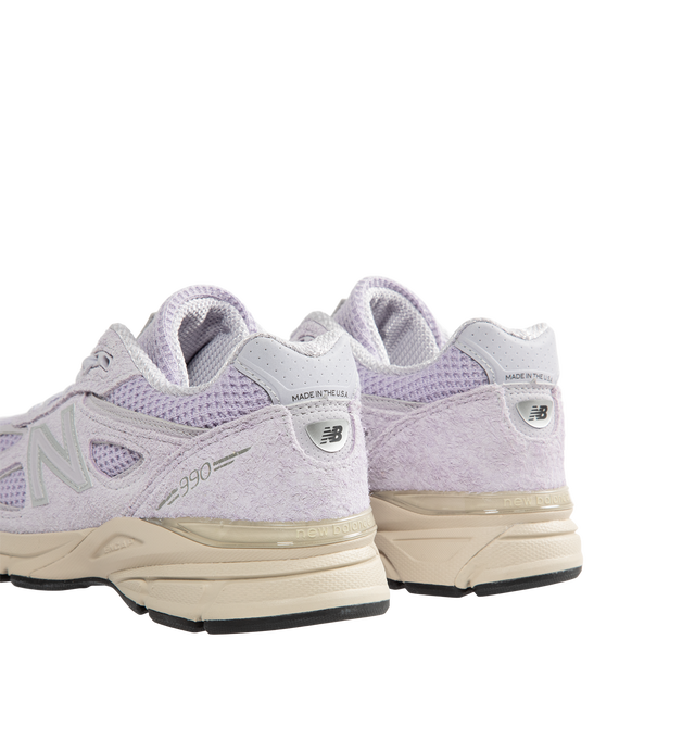 Image 3 of 5 - PURPLE - New Balance Men's Made in USA 990v4 Sneakers are crafted from suede and synthetic overlays. Designed with a padded collar, TPU top eyelets, flat cotton laces, and signature N branding at the side panel, they are finished with a 990v4 logo patch on the tongue, 990 branding at the ankle, NB Made in USA branding at the heel, an ENCAP midsole, and a durable rubber outsole. Main Material: Suede & Mesh, Suede, and Synthetic. Sole: Rubber. Cushioning: ENCAP midsole. Made in USA. 