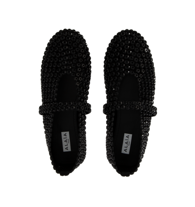 Image 4 of 4 - BLACK - ALAA signature ballet flats inspired by classical Japonese shoes featuring elasticated strap on top, round toes, rubber sole, suede goatskin leather perforated and embroidered with glass eyelets. Made in Italy. 