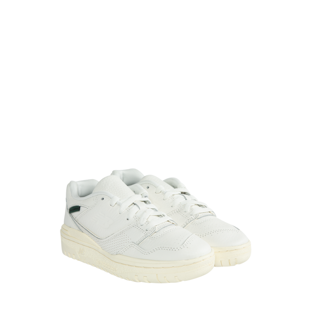 Image 2 of 5 - WHITE - NEW BALANCE 550 Mini Logo Sneaker featuring a debossed NB logo, premium white leather, green tag on the lateral ankle and rubber sole.  