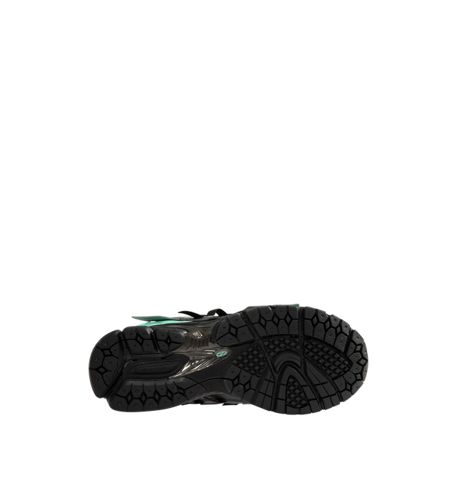 Image 4 of 5 - BLACK - New Balance Unisex 1906A "Tech Explosion / Black Bright Mint" Sneakers feature a performance-inspired silhouette rooted in early-2000s running design and equipped with advanced cushioning technologies for all-day comfort. Built with a breathable mesh upper, mesh underlays, and curvilinear synthetic overlays, this updated style combines technical heritage with a modern aesthetic. The sole unit pairs ACTEVA LITE cushioning, ABZORB SBS heel pods, and an N-ergy outsole for responsive co 