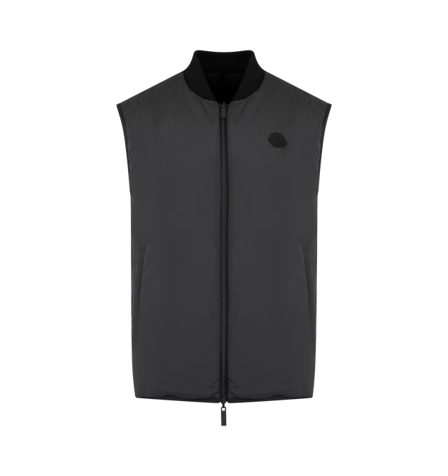 Image 3 of 3 - BLACK - MONCLER Reversible Padded Vest featuring waffle polyester, rib knit bomber collar in cotton, reversible, padded, zipper closure, zipped pockets and silicone logo patch. 100% polyester. Made in Turkey 