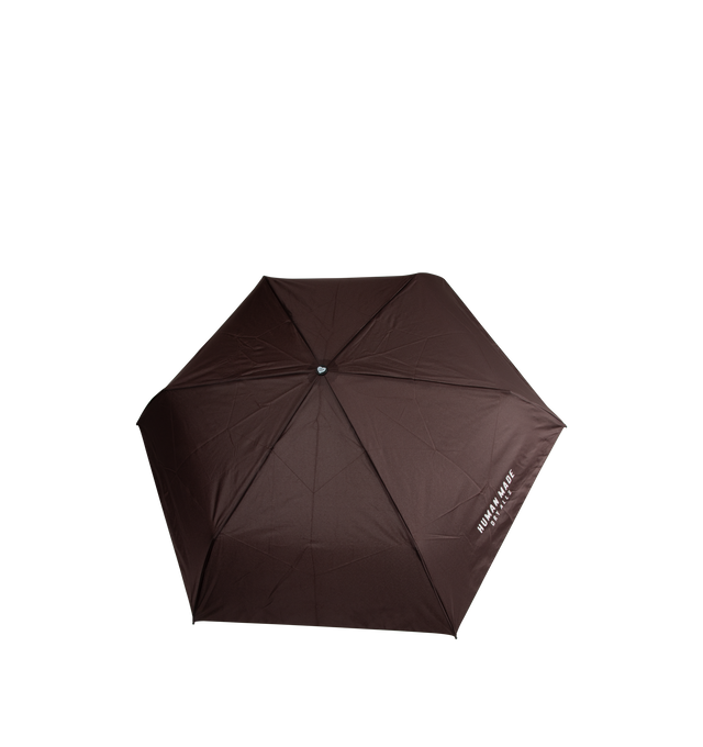 Image 2 of 2 - BROWN - Human Made Compact Umbrella has the brand's Duck motif on the handle and it comes with a bag for carrying. Wood, aluminum, polyester.  