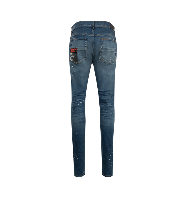 Image 2 of 3 - BLUE - Amiri Lounge Skinny Jeans are a 5-pocket style with crystal-embellished fabric patches, distressing, and paint spatters. Made in USA.  