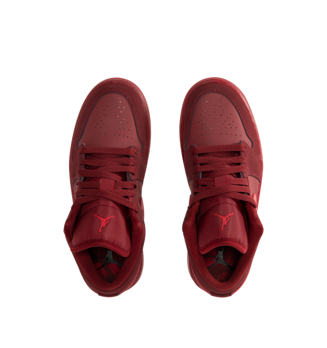 Image 5 of 5 - RED - JORDAN Air Jordan 1 Low SE Sneaker featuring leather in the upper, encapsulated Nike Air-Sole unit provides lightweight cushioning, rubber in the outsole, lace up closure, wings logo on heel and Jumpman on tongue. 