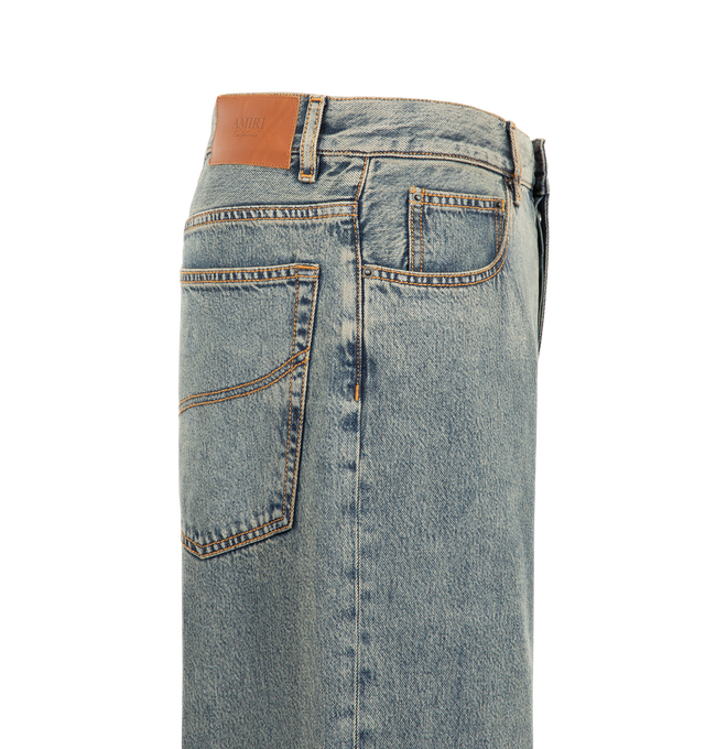 Image 3 of 3 - GREY - Amiri Men's Loose-Fit Jeans are crafted from indigo blue cotton denim with a washed finish. Cut for a loose fit, they feature classic five-pocket styling, a rear logo patch, belt loops, and a button-and-zip fly. Main Material: 100% Cotton. 