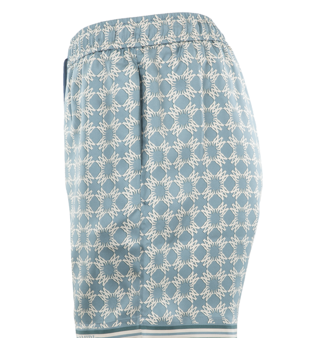 Image 3 of 3 - BLUE - AMIRI MA Quad Silk Shorts featuring monogram logo print, elasticized drawstring waistband, side seam pockets and pulls on. 100% silk. 