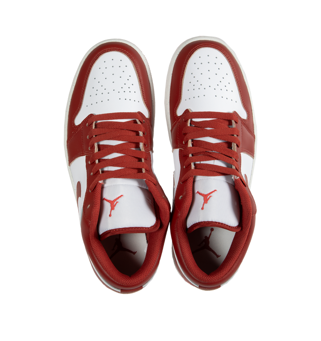 Image 5 of 5 - RED - AIR JORDAN 1 low-top lace-up sneakers crafted from leather and textiles in the upper for durability and structure and Nike Air-Sole unit for lightweight cushioning.Rubber in the outsole gives you traction on a variety of surfaces. Features stitched-down Swoosh logo and Jumpman Air design on tongue. 