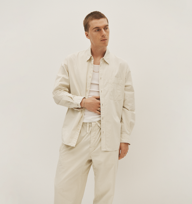 Image 3 of 4 - WHITE - Lemaire Relaxed Workwear Shirt has a classic collar, a snap-fastening front, button cuffs, and a chest patch pocket. 100% cotton.  