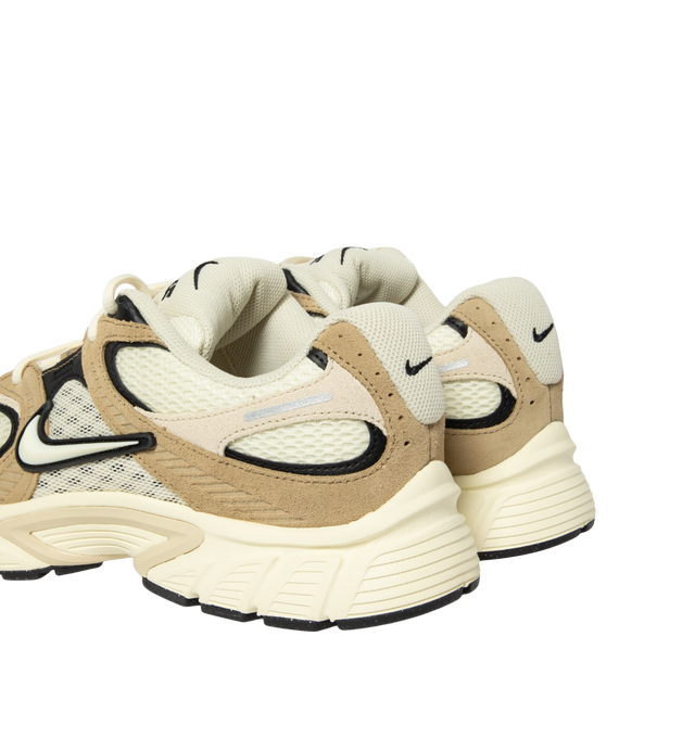 Image 3 of 5 - NEUTRAL - Nike V5 RNR Sneakers feature a streamlined silhouette designed for smooth, steady movement. A low-cut collar allows natural ankle mobility, while reflective details enhance visibility in low-light conditions. 