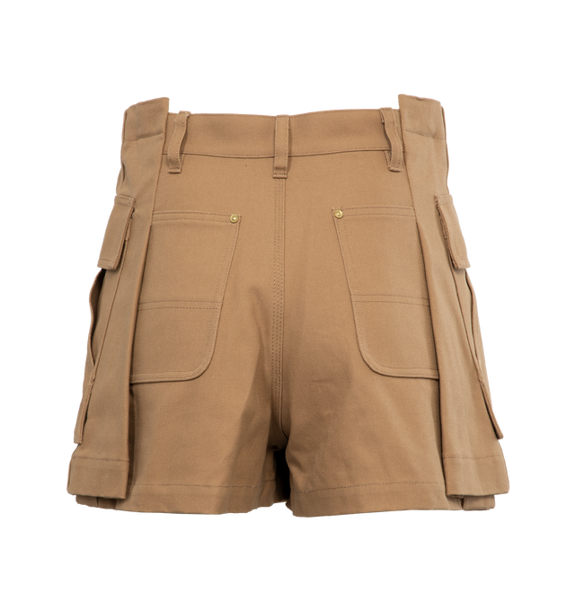 Image 2 of 4 - BROWN - SACAI X CARHARTT WIP Canvas shorts with zip and double button closure, pockets and front logo patch, hammer loop detail at the back pocket,  belt loops, gold tone hardware. Features skirt overlay in front with cargo pockets, zip and button closure. Women's Japanese sizing. JP size 1 = US X-small. JP size 2 = US small. JP size 3 = US medium. JP size 4 = US large.   