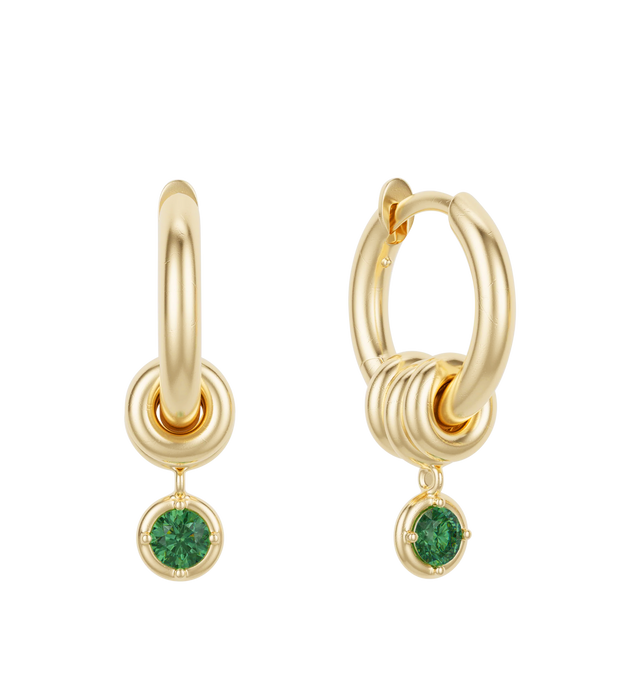 Image 2 of 2 - GOLD - Spinelli Kilcollin Zahra Hoop Earrings display a familiar, streamlined silhouette and comfort closure in 18k gold or .925 sterling silver. Three annulets adorn each hoop, the center of which bears a drop charm for added contrast and movement. Each Zahra Hoop Earring is individually handmade in Los Angeles. Hoops: 18k yellow gold, 2mm gauge, 9mm internal diameter. Stones: Emeralds (approx. 0.22 cttw). Annulets: 18k yellow gold. Sold as a pair. Hirshleifers offers a range of pieces from  