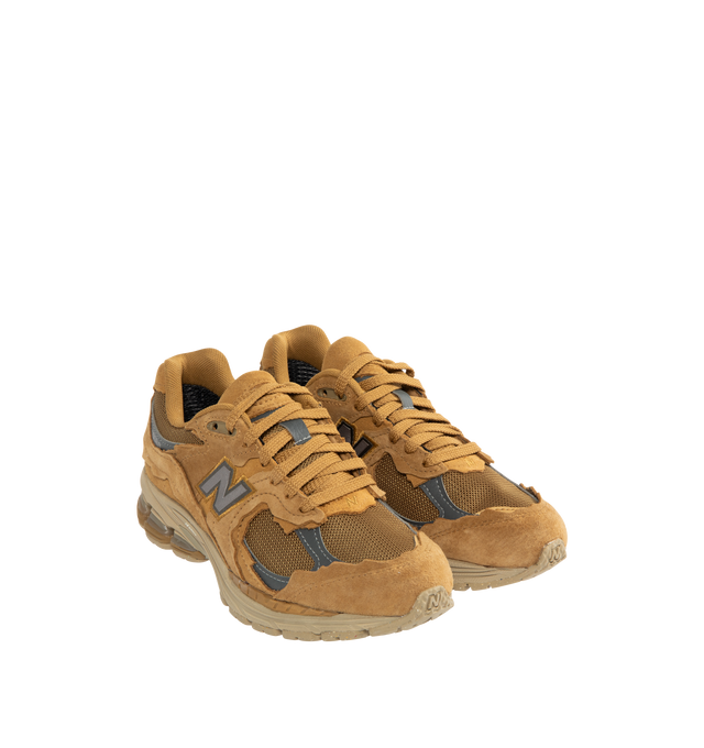 Image 2 of 5 - BROWN - NEW BALANCE 2002DX Sneaker featuring soft French terry fabric, ABZORB midsole, ABZORB SBS heel cushioning, N-ergy technology for superior shock absorption, atability Web outsole technology and GORE-TEX waterproof fabric. 