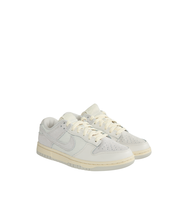Image 2 of 5 - WHITE - NIKE Dunk low-top sneakers in a lace-up style crafted with leather upper, textile lining and rubber sole. 