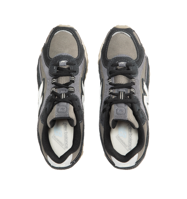 Image 5 of 5 - BLACK - NEW BALANCE 204L Sneaker featuring multi-piece upper with embossed overlay, screen-printed graphics along the saddle, distinctive outsole with 2000s-inspired strike path and 70s-influenced tread pattern, double-stacked suede 'N' logo and lace up closure. Premium suede upper. EVA outsole. 