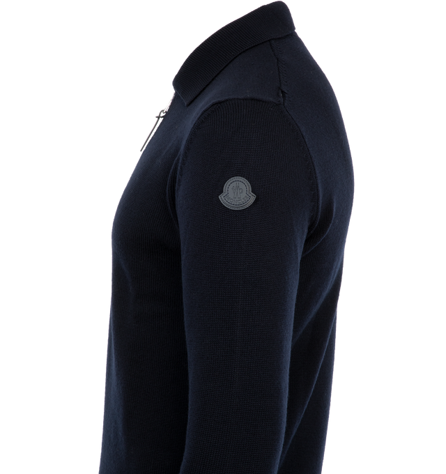 Image 3 of 3 - NAVY - MONCLER Wool Polo Sweater featuring ultra-fine responsibly sourced wool, stockinette stitch, gauge 7, polo collar, zipper closure and leather logo patch. 100% virgin wool. 