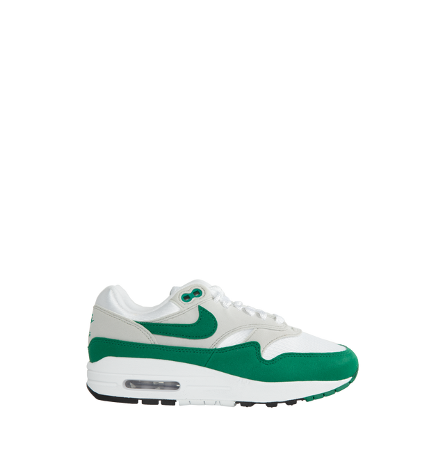 GREEN - NIKE Air Max 1 featuring mixed materials, visible Max Air unit, padded, low-cut collar, wavy mudguard and pill-shaped Nike Air window and rubber outsole.