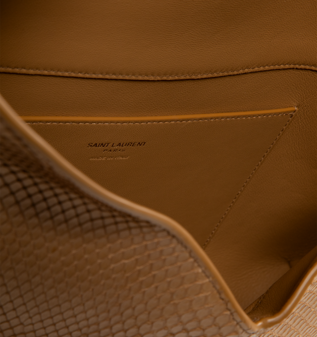 Image 3 of 3 - BROWN - SAINT LAURENT Large Envelope Clutch in Python featuring metal-free tanned leather, leather lining, bronze-tone hardware and magnetic flap closure with the cassandre. 11.6" x 7.1" x 1.8". Python, brass. Made in Italy. 