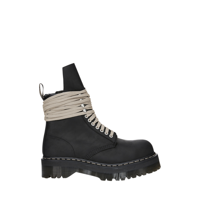 Image 1 of 7 - BLACK - Dr. Martens x Rick Owens FW26 Quad Sole Steel Toe Boot in Nubuck Leather. These Women's Dr. Martens boots are reimagined by Rick Owens and feature pearl lacing, a steel toe cap, and palladium-finish hardware, including eyelets, hooks, and a side zipper. The boot features an extended geometric tongue and a woven Dr. Martens AirWair heel loop in black and pearl. Finished with a Quad sole, the design is detailed with a pearl welt stitch. This heavyweight nubuck cow leather has a flat, ma 