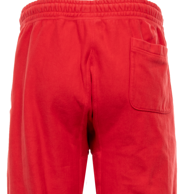 Image 5 of 5 - RED - SAINT MICHAEL Sweat Pants featuring elastic waist with drawstrings, side pockets and back pocket, logo on leg, no side seam and elastic hem. 100% cotton. 