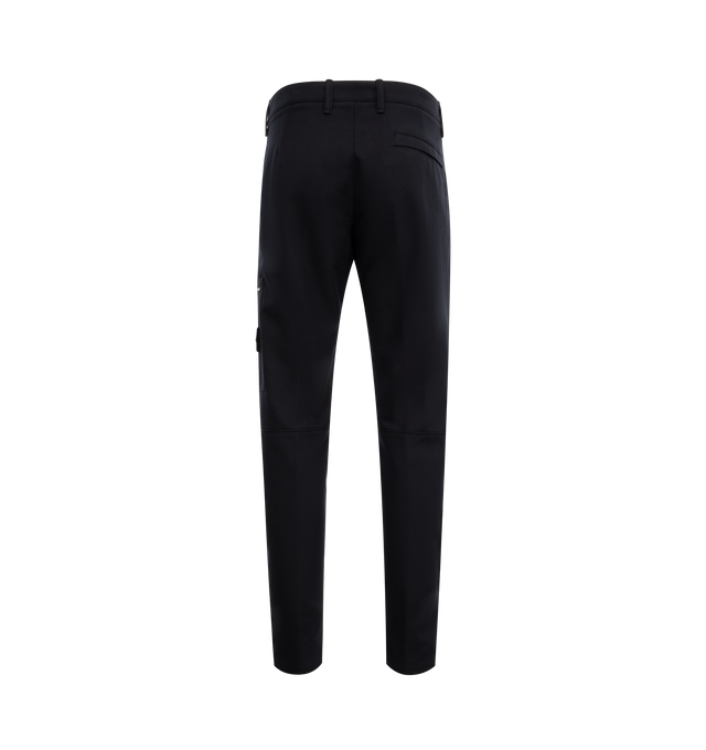 Image 2 of 3 - NAVY - STONE ISLAND Trousers featuring a front zip and button fastening, belt loops, two zipped side welt pockets, a back welt pocket and a patch pocket on the side with zip and Compass logo label. 55% cotton, 45% polyamide. 