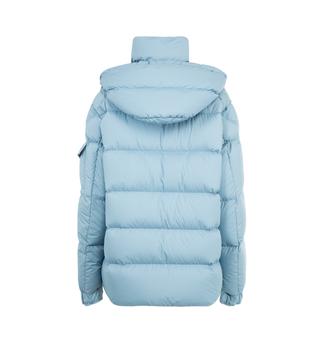 Image 3 of 4 - BLUE - MONCLER Maya 70 Hooded Short Down Jacket featuring recycled polyester, polyester lining, down-filled, detachable and adjustable hood, zipper and snap button closure, zipped pockets, sleeve pocket with snap button closure, adjustable cuffs, hem with drawstring fastening and logo. 100% polyester. Padding: 90% down, 10% feather. 