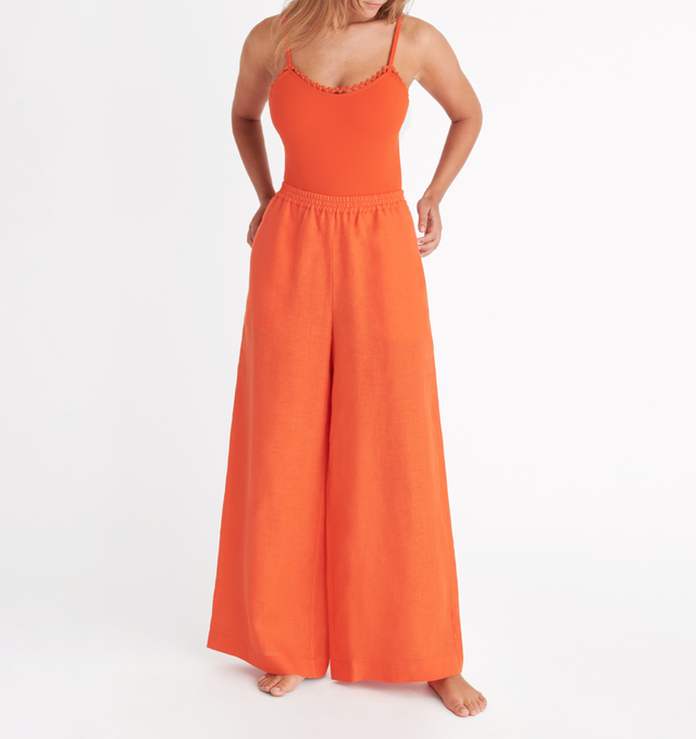 Image 3 of 5 - ORANGE - ERES Select Wide Pants featuring two patch pockets at the front and back, wide hems at the bottom and elastic at the waist. 100% Linen. Made in Bulgaria. 
