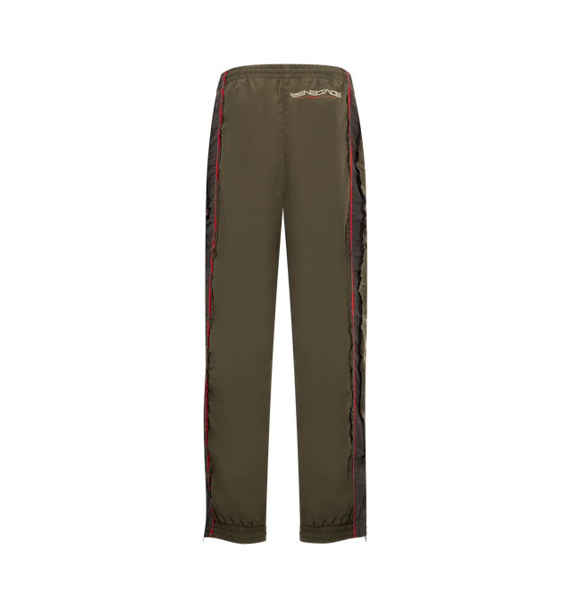 Image 2 of 3 - GREEN - MARTINE ROSE Layered Track Pant featuring interior drawstring tie closure, elasticized waistband, side zip pockets, back embroidered logo, zip hem and midweight ripstop fabric. 100% polyamide, Lining: 100% polyester. 