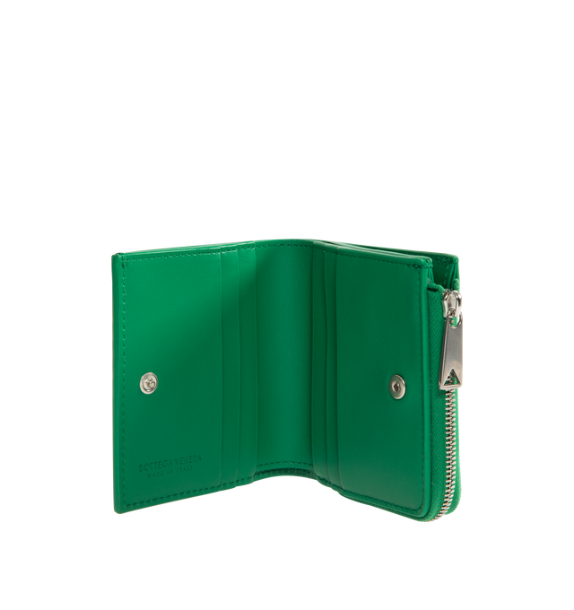 Image 3 of 3 - GREEN - BOTTEGA VENETA Bi-Fold Wallet in calf leather with embossed Intrecciato pattern featuring six card slots, one bill compartment, one zippered coin purse and press stud closure. Calfskin. Made in Italy. 