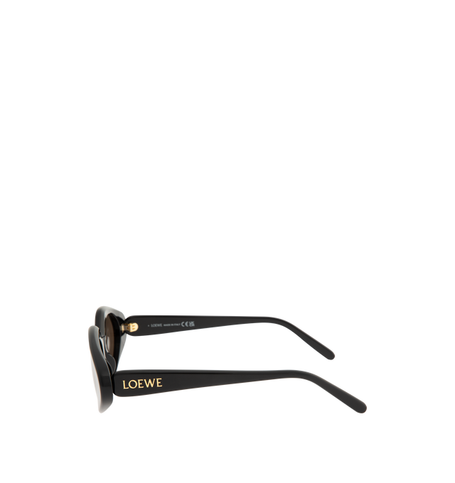 Image 2 of 3 - BLACK - LOEWE Triangle Slim Sunglasses featuring triangle-shaped sunglasses in a slim acetate construction, international fit, UVA/UVB protection and gold-finish metal LOEWE. Acetate. Made in Italy. 