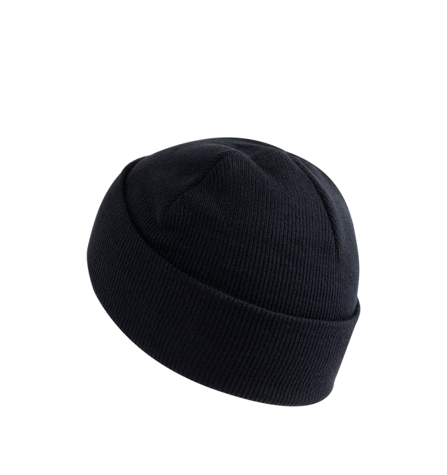 Image 2 of 2 - NAVY - CARHARTT WIP Chase Beanie featuring a soft 9 gauge stretchable rib-knit fabric and a woven Carhartt WIP label on the front. 100% acrylic.  