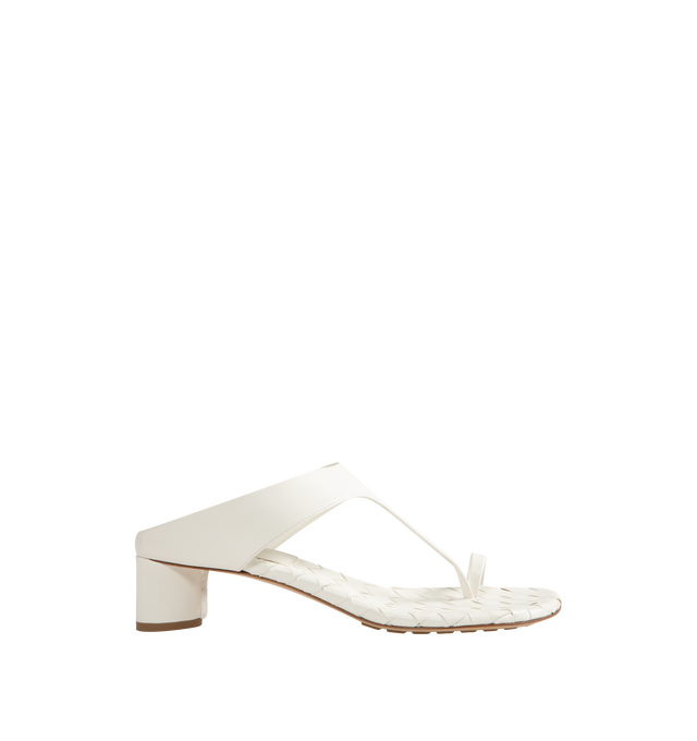 Image 1 of 4 - WHITE - Bottega Veneta Womens Kitten Heel Thong Sandals are crafted from nappa leather. Feature a toe-ring leather strap, Intrecciato leather insole, lambskin lining, kitten heel, and rubber-injected leather outsole. Upper: Nappa Leather; Lining: Lambskin; Outsole: Rubber-Injected Leather. Made in Italy. 