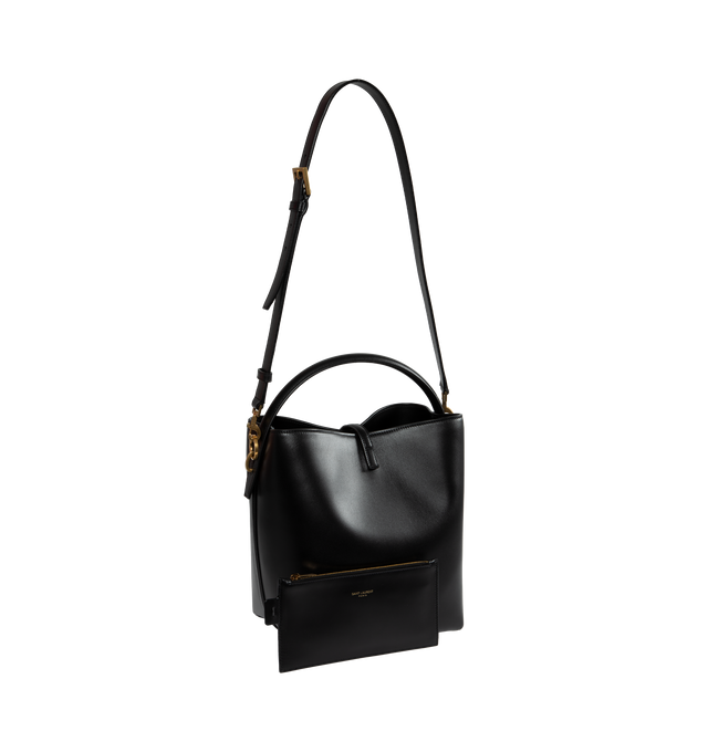 Image 2 of 3 - BLACK - SAINT LAURENT Le 37 Bucket Bag featuring metal cassandre hook closure, one zipped pouch, suede lining, and four metal feet. 20 X 25 X 16cm. Handle drop: 9cm. Strap drop: 40cm. 100% calfskin leather. Made in Italy.  