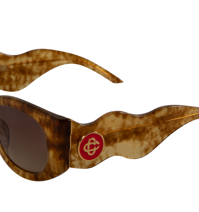 Image 3 of 3 - BROWN - CASABLANCA Wave Sunglasses featuring oval semi-transparent tortoiseshell acetate-frame, gradient brown lenses, 100% UVA/UVB protection, integrated nose pads, enameled logo hardware at temples and exposed core wires. Acetate. Made in Japan. 