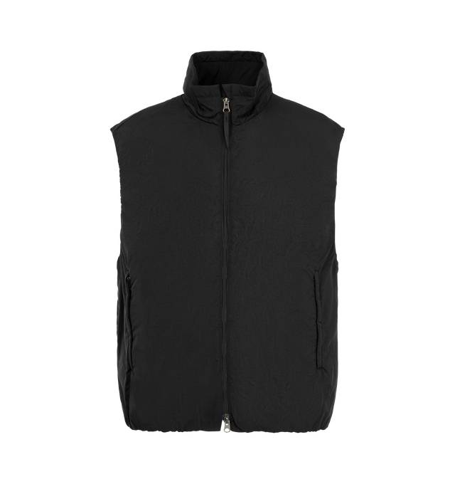 Image 1 of 2 - BLACK - Kaptain Sunshine Men's Shrink Nylon Puff Vest is crafted from shrink-processed nylon fabric that develops a natural texture, distinctive wrinkled appearance, and subdued sheen through a specialized salt-shrink treatment applied to fine-count nylon yarns. Fully insulated with a lightly structured construction, this relaxed-fitting vest features a stand collar, front zip closure, and two zip pockets for functional everyday wear. Main Material: Nylon. Made in Japan. 