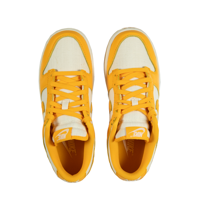 Image 5 of 5 - YELLOW - NIKE Dunk Low Retro Basketball Sneaker featuring lace-up style, removable insole, leather and textile upper, synthetic lining and rubber sole.  