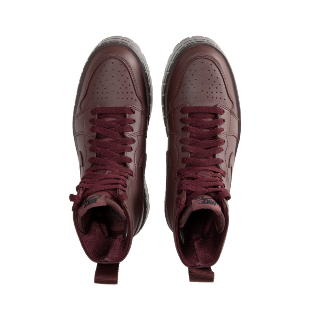 Image 5 of 5 - PURPLE - Air Jordan Brooklyn rugged sneaker boot crafted from luxe full-grain leather with a chunky platform sole, exaggerated outsole lugs, Nike Air cushioning, and diamond inset on the heel with Jumpman insignia. 