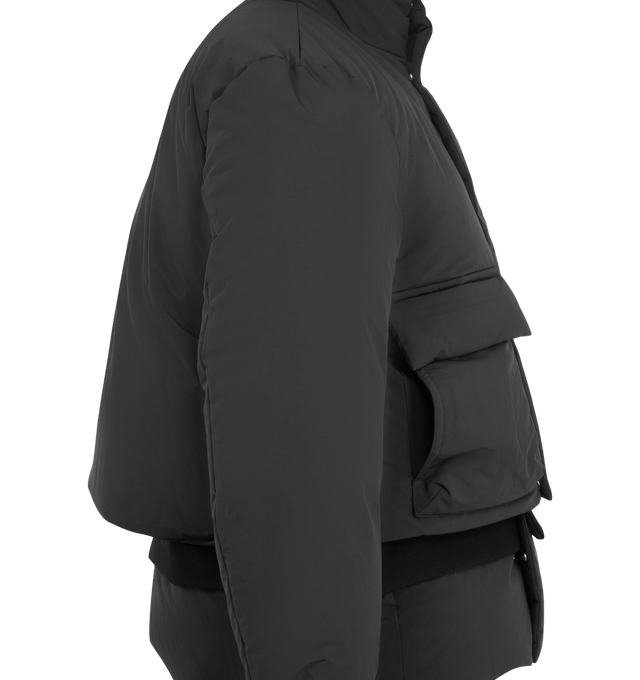 Image 3 of 5 - BLACK - Sacai Men's Double Padded Jacket with Zip Closure is crafted from polyester and features an oversized hybrid silhouette that combines elements of a jacket and coat. Designed with a concealed zip closure beneath a buttoned placket, a layered lower section with button fastening, front patch pockets, and ribbed elasticated cuffs for a functional yet refined finish. Main Material: 100% Polyester. 