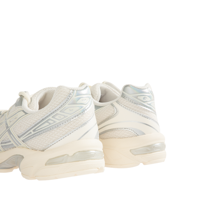 Image 3 of 5 - WHITE - ASICS GEL-1130 Sneaker featuring overlays and breathable mesh underlays, sockliner, GEL technology cushioning for shock absorption, TRUSSTIC support system and at least 20% of the upper's synthetic leather is made with recycled materials. 