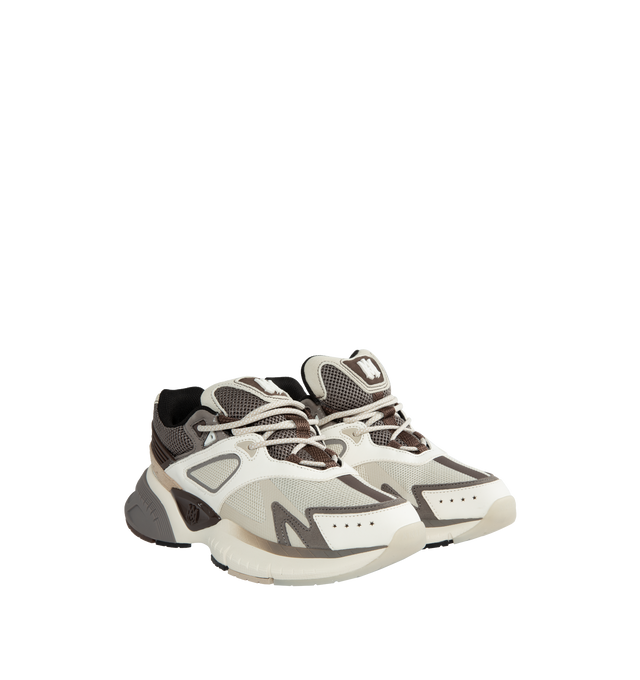 Image 2 of 5 - BROWN - AMIRI MA Runner Sneakers featuring lace-up closure, padded tongue and collar, perforated detailing at sides, padded footbed, mesh lining, sculptural foam rubber midsole and treaded rubber sole. Upper: leather, textile. Sole: rubber. Made in China. 