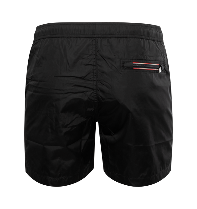 Image 2 of 3 - BLACK - MONCLER Swim Shorts featuring waistband with drawstring fastening, side pockets, zipped back pocket and silicone logo patch. 100% polyamide/nylon. 