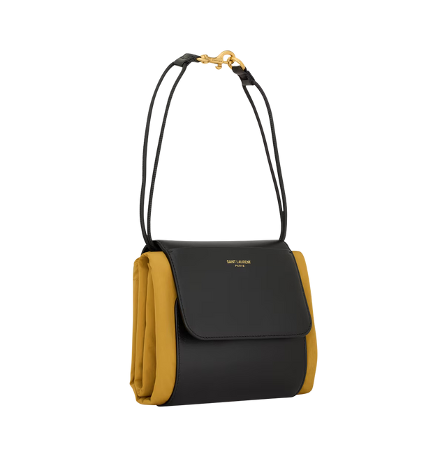 Image 5 of 5 - YELLOW - SAINT LAURENT Foulard Folding Pouch in nylon and leather featuring modular supple pouch with a drawstring carabiner shoulder strap, logo embossed flap with front pocket, viscose lining, bronze-tone hardware, snap-button and drawstring closures, one card slot and one flat pocket at the front. 16.5" x 18.9" x 0.2". Nylon, canvas, calfskin, cotton. Made in Italy. 