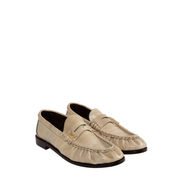 Image 2 of 4 - NEUTRAL - SAINT LAURENT Le Loafer Penny Slippers featuring cassandre in gold toned metal and leather sole. 100% eelskin. 